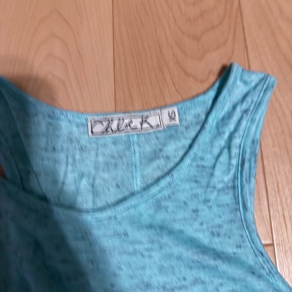 Blue tank top with accent lime green zipper on pocket. - Picture 2 of 2